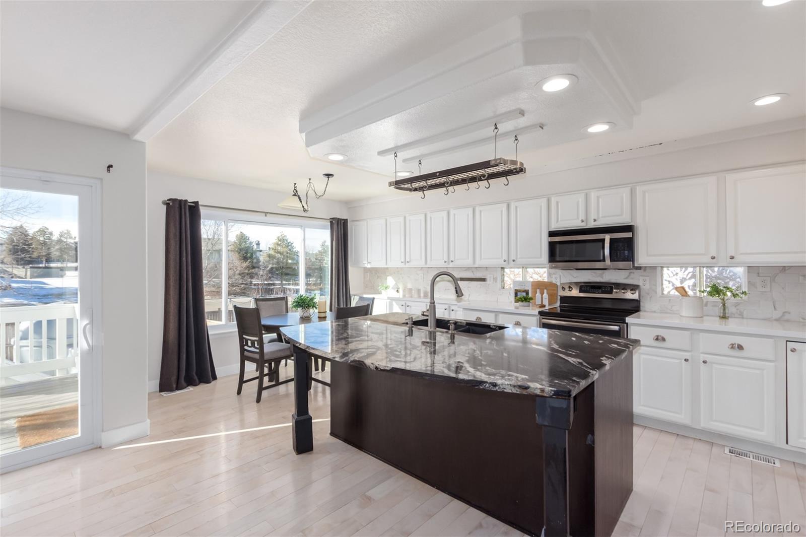 9779 Dampler Way Highlands Ranch, CO 80130 - Photo 7 of 49 Gallery Image 7