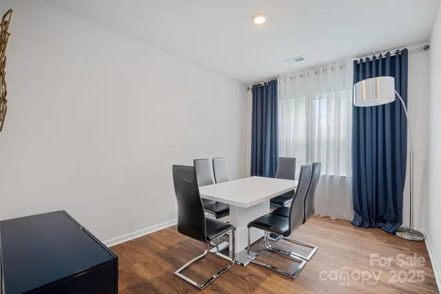 a workspace with furniture and a window