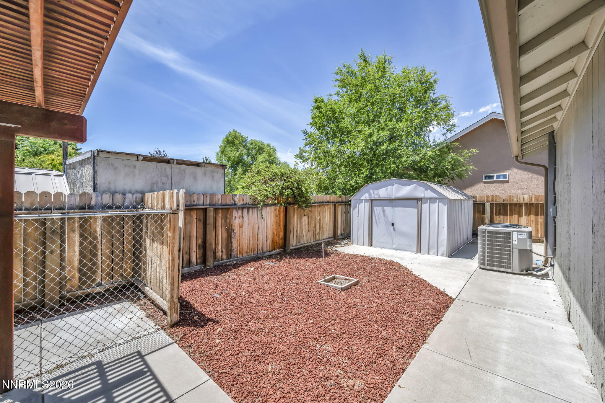 692 Lassen Way Gardnerville, NV 89460 - Photo 31 of 34 a front view of a house with a garden