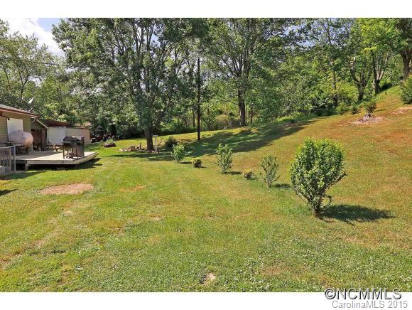 951 Old Clyde Road Clyde, NC 28721 - Photo 3 of 18 a view of a yard with swimming pool