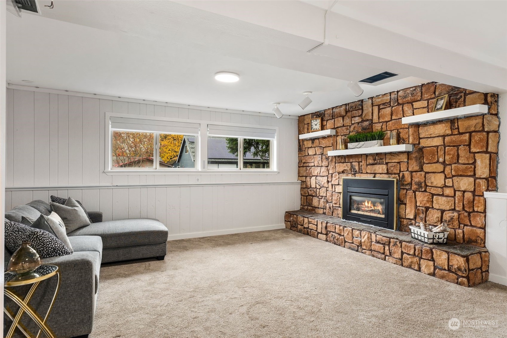 16304 128th Place Southeast Renton, WA 98058 - Photo 23 of 31 a living room with furniture and a fireplace