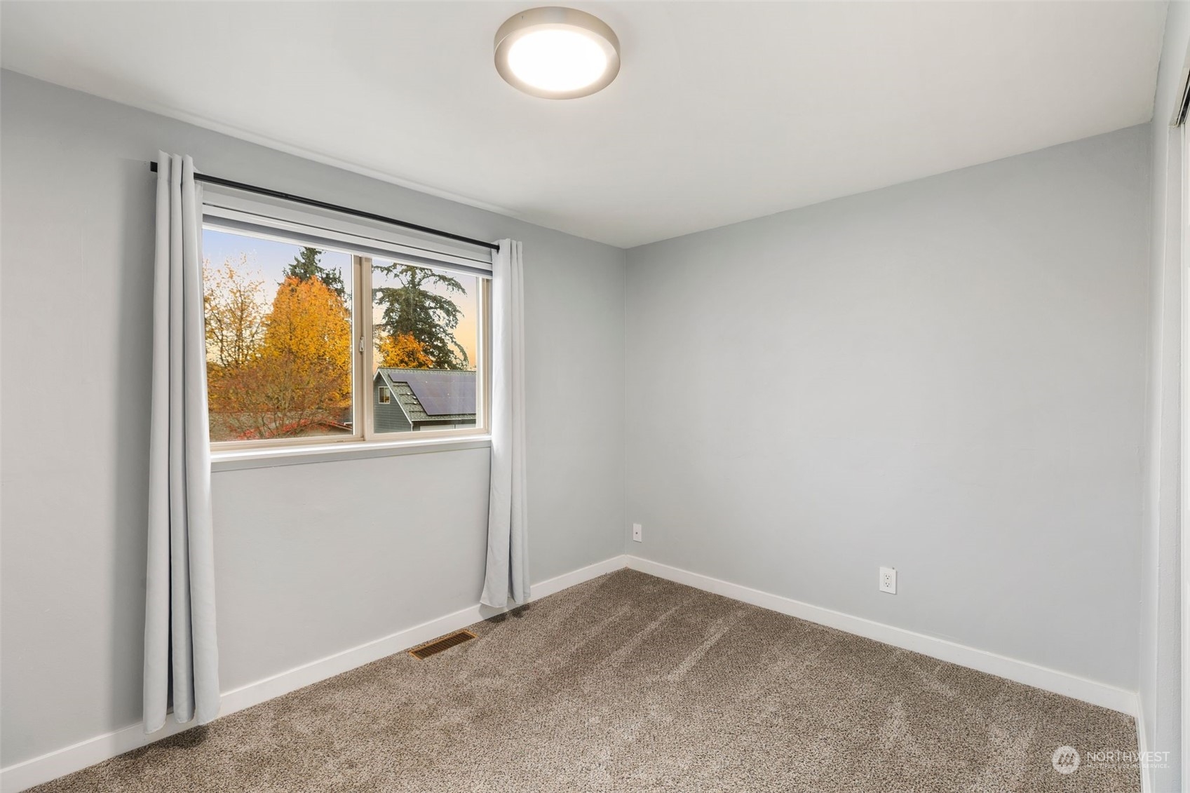 16304 128th Place Southeast Renton, WA 98058 - Photo 25 of 31 an empty room with window