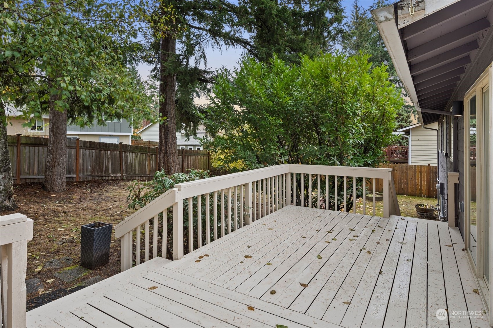 16304 128th Place Southeast Renton, WA 98058 - Photo 28 of 31 a view of balcony with wooden floor and fence