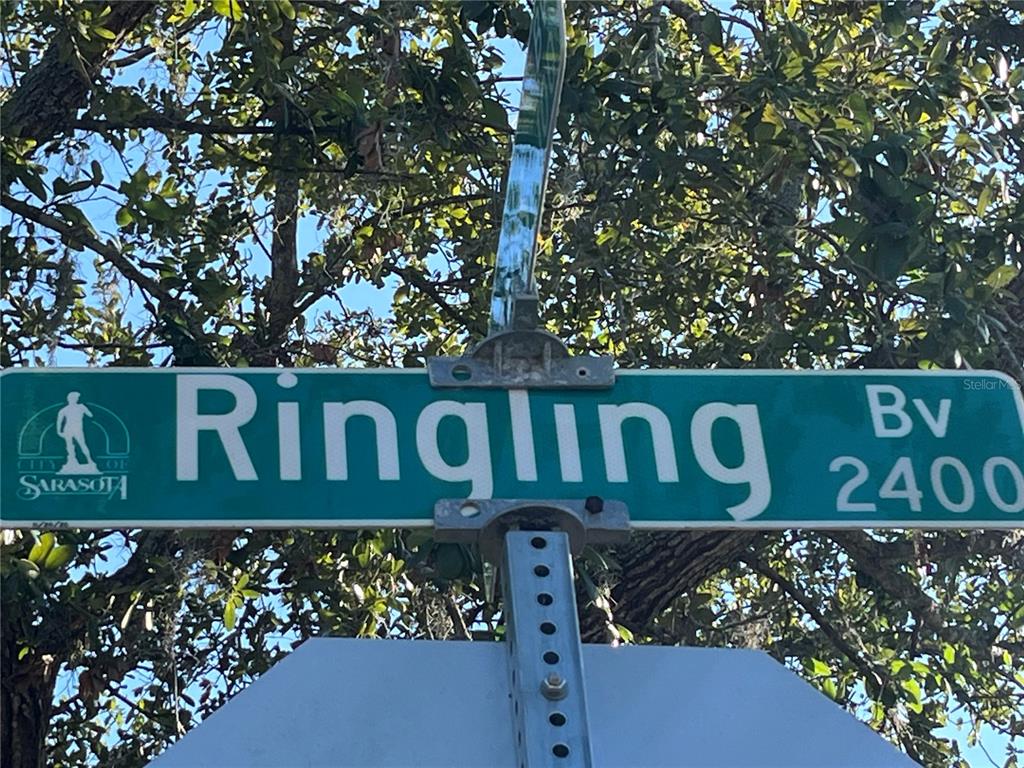 2450 Ringling Boulevard Sarasota, FL 34237 - Photo 5 of 5 a street sign that is on a pole