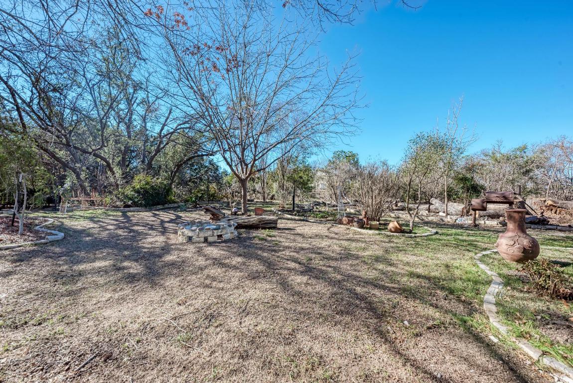 321 Navajo Trail Georgetown, TX 78633 - Photo 27 of 40 a view of dirt yard with a tree