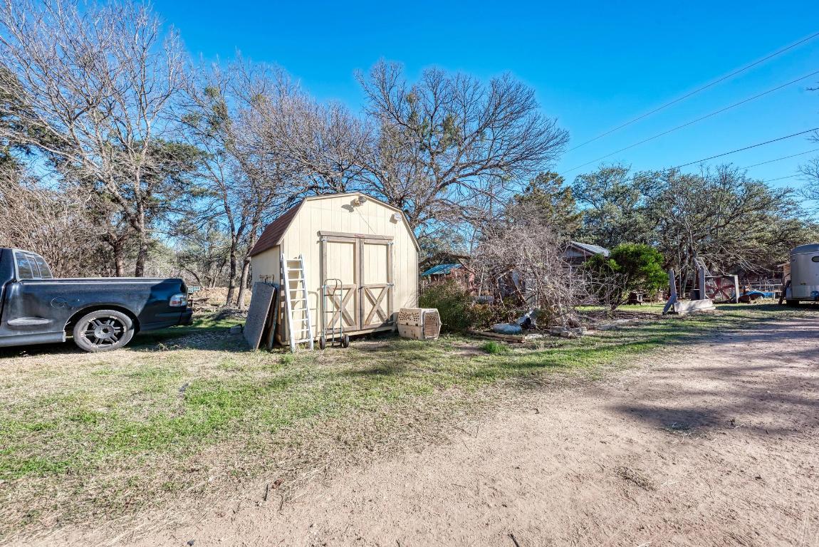 321 Navajo Trail Georgetown, TX 78633 - Photo 29 of 40 a view of a house with a yard