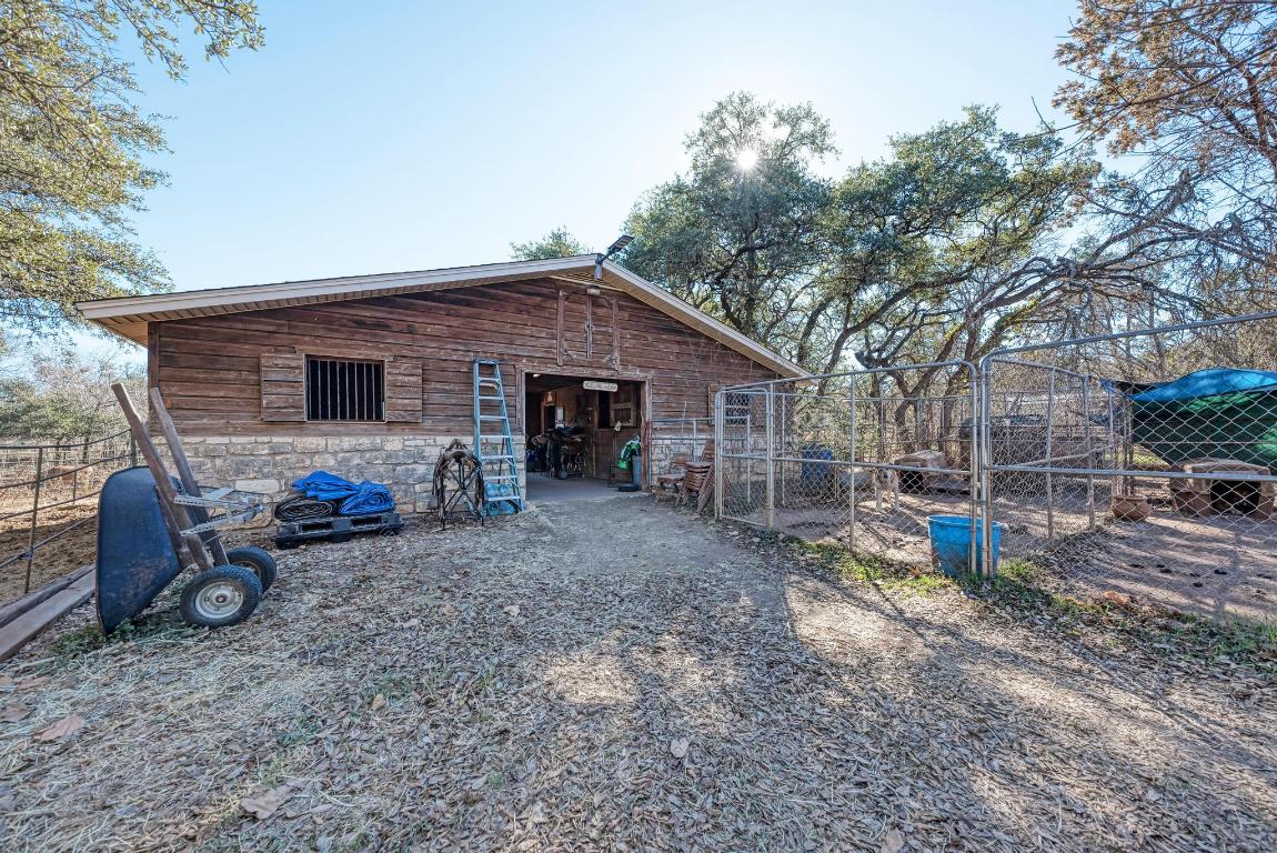 321 Navajo Trail Georgetown, TX 78633 - Photo 33 of 40 a view of a house with a yard and large trees