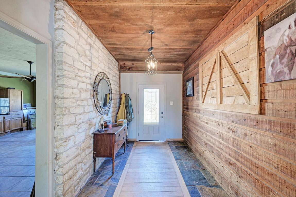 321 Navajo Trail Georgetown, TX 78633 - Photo 6 of 40 a view of a entryway door with wooden floor