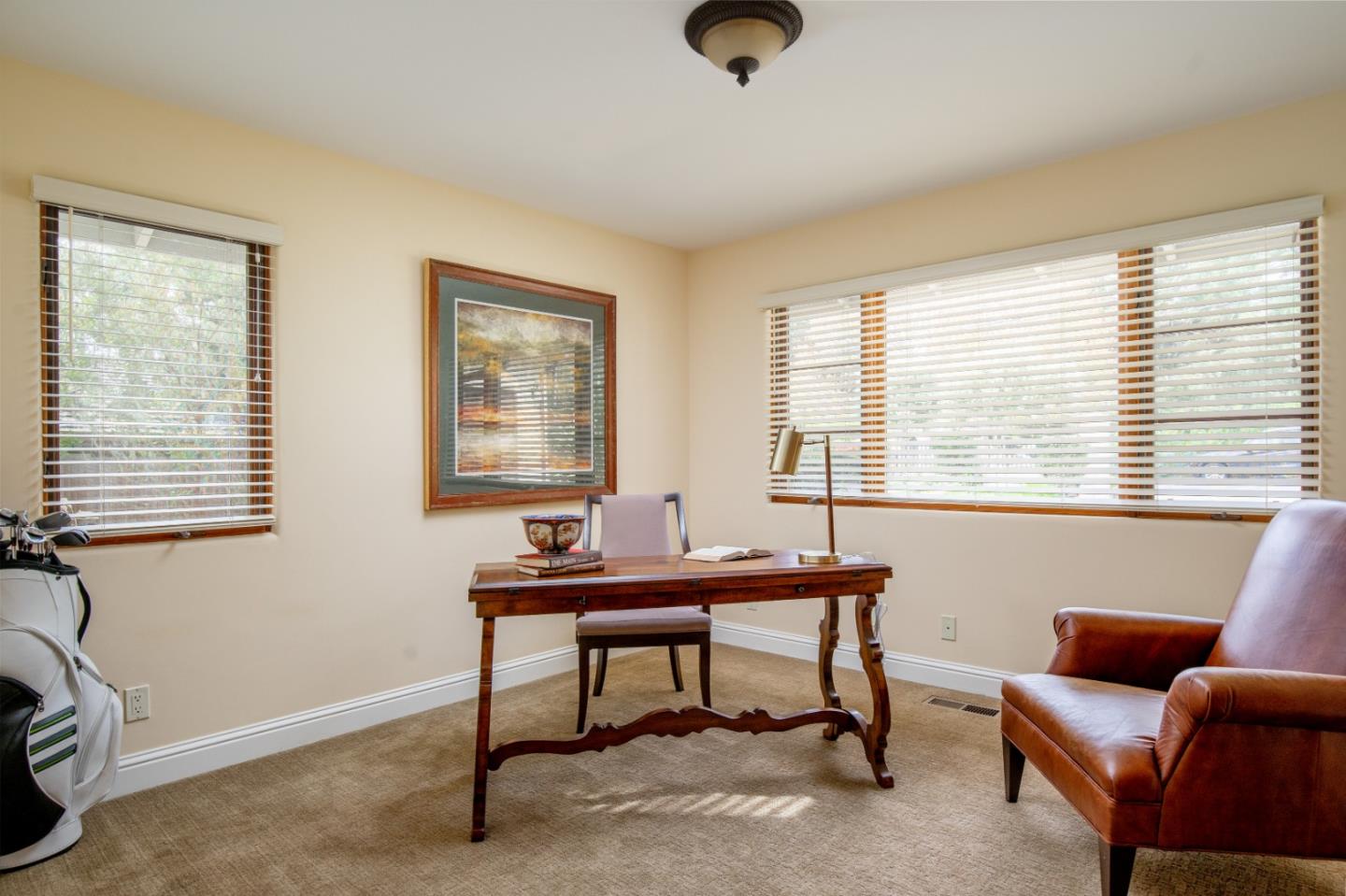 1060 Rodeo Road Pebble Beach, CA 93953 - Photo 17 of 30 a workspace with furniture and a window