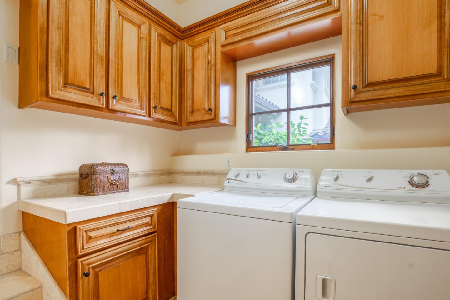 1060 Rodeo Road Pebble Beach, CA 93953 - Photo 25 of 30 a utility room with dryer and washer