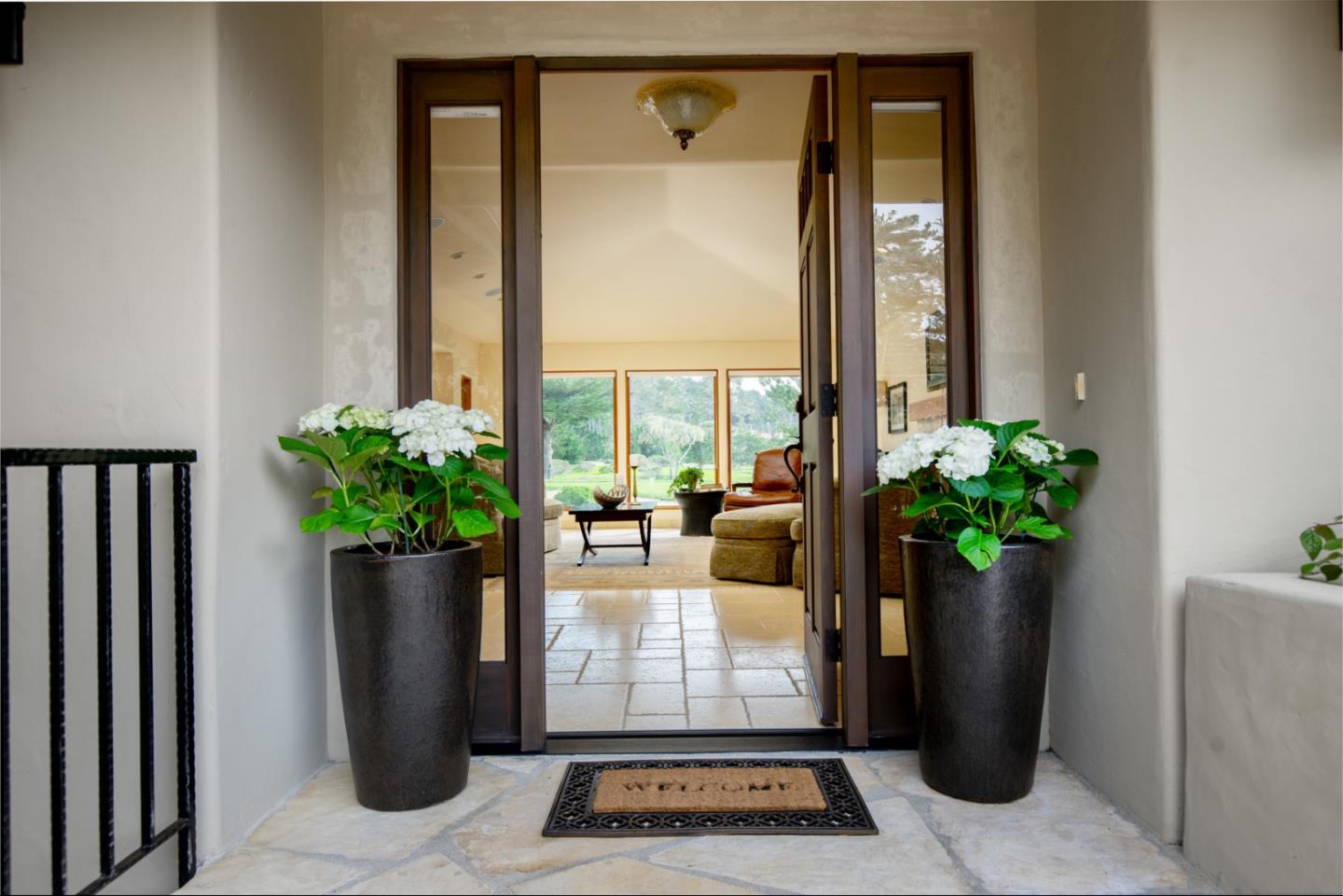 1060 Rodeo Road Pebble Beach, CA 93953 - Photo 3 of 30 a view of water heater room with a potted plant