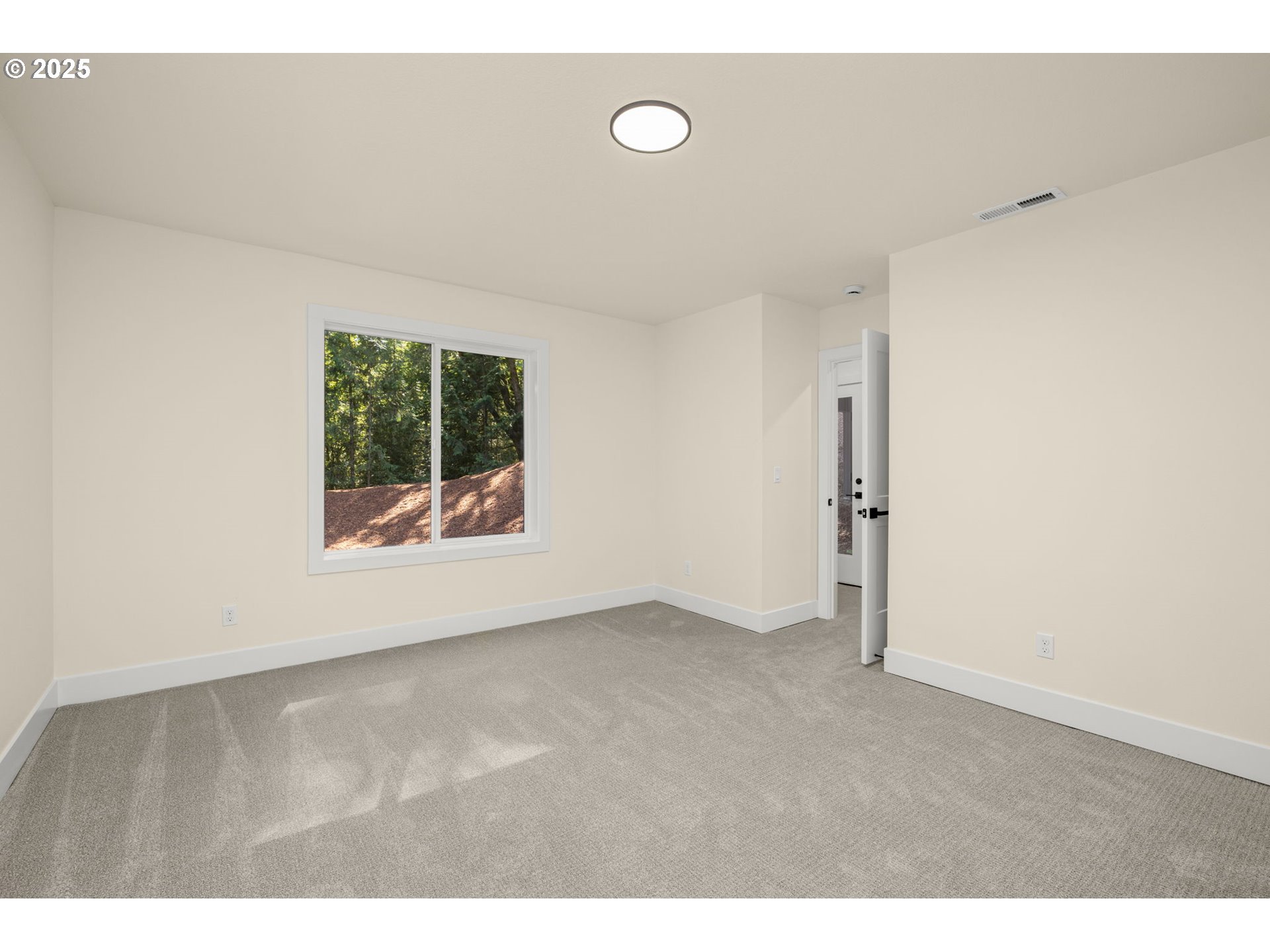 32904 Northwest View Terrace Place Scappoose, OR 97056 - Photo 27 of 34 a view of an empty room with a window