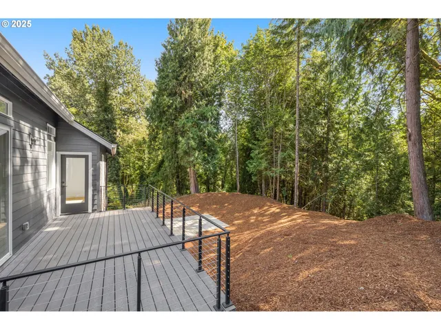 a view of balcony with wooden floor