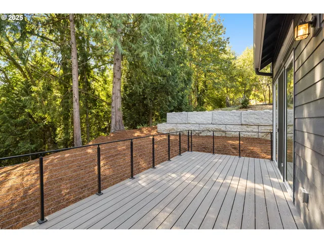 a backyard of a house with yard and outdoor seating
