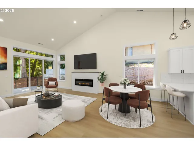 a living room with fireplace furniture and a flat screen tv