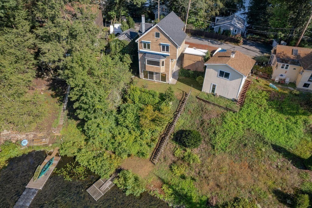 98 Dudley Road Wayland, MA 01778 - Photo 1 of 41 an aerial view of a house with a yard