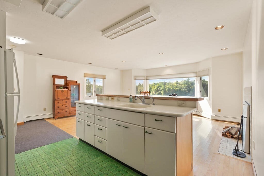98 Dudley Road Wayland, MA 01778 - Photo 14 of 41 a bathroom with a granite countertop sink and a mirror