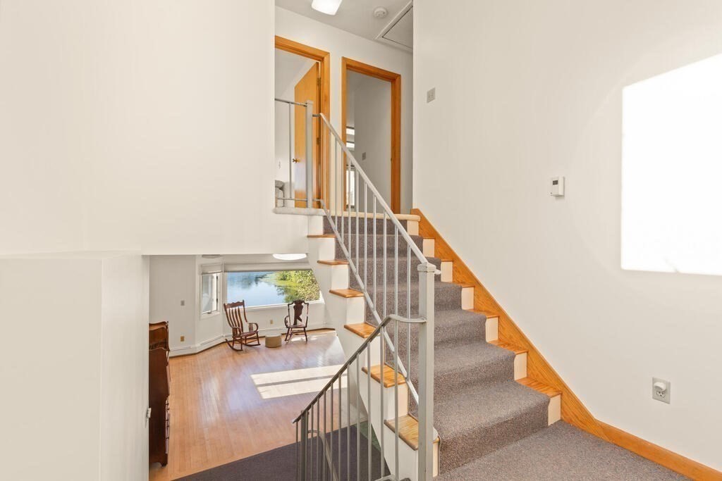 98 Dudley Road Wayland, MA 01778 - Photo 16 of 41 a view of entryway and hall with wooden floor
