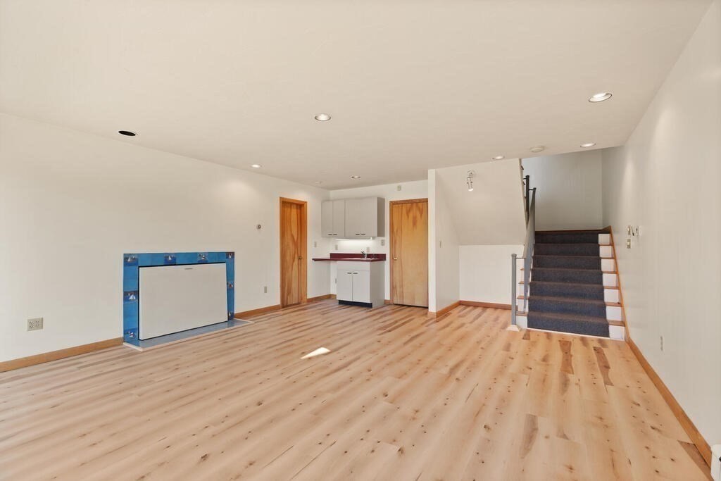 98 Dudley Road Wayland, MA 01778 - Photo 19 of 41 a view of empty room with wooden floor