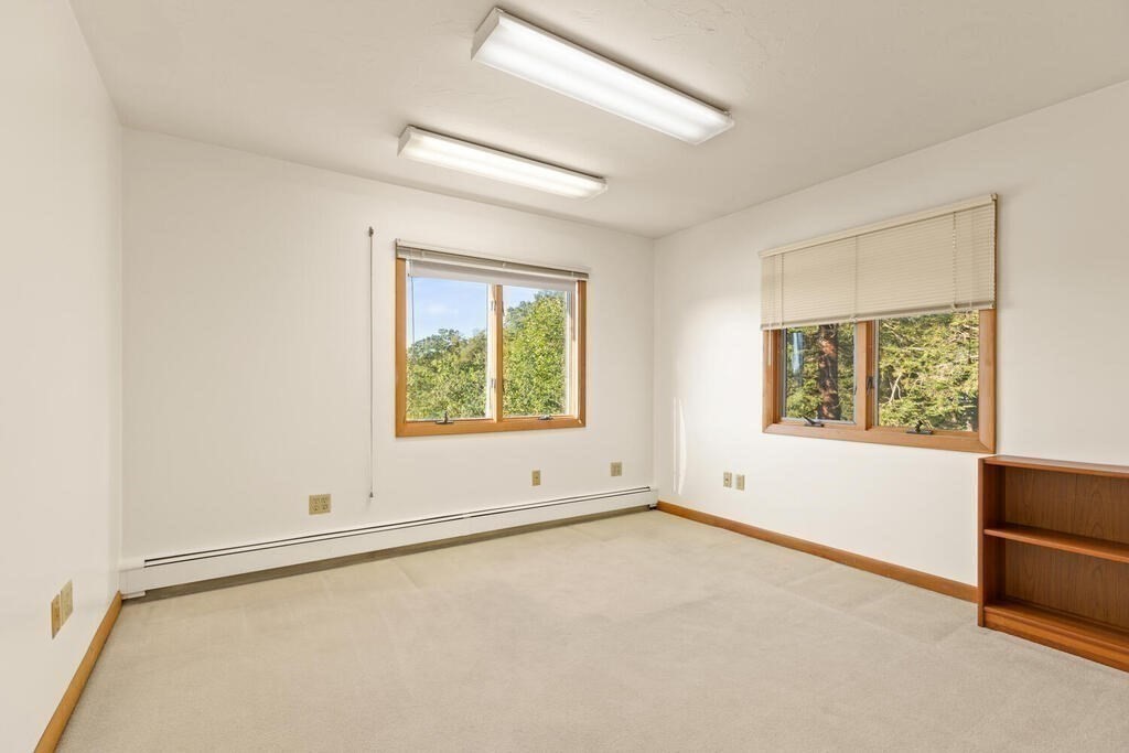 98 Dudley Road Wayland, MA 01778 - Photo 24 of 41 an empty room with windows
