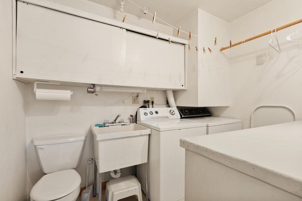 98 Dudley Road Wayland, MA 01778 - Photo 29 of 41 a bathroom with a sink toilet and shower