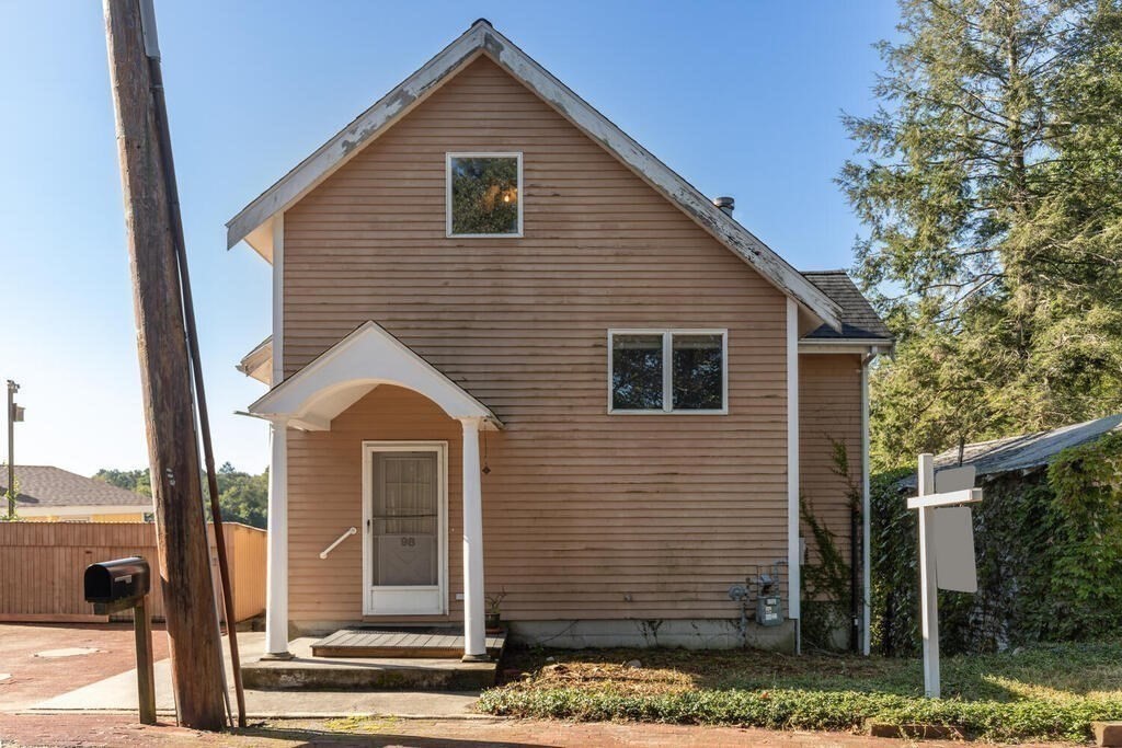 98 Dudley Road Wayland, MA 01778 - Photo 32 of 41 a front view of a house with a yard
