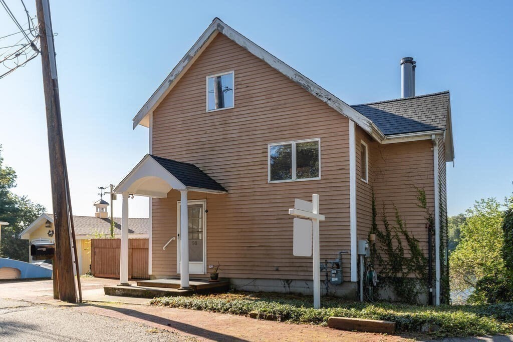 98 Dudley Road Wayland, MA 01778 - Photo 33 of 41 a view of a house with a yard