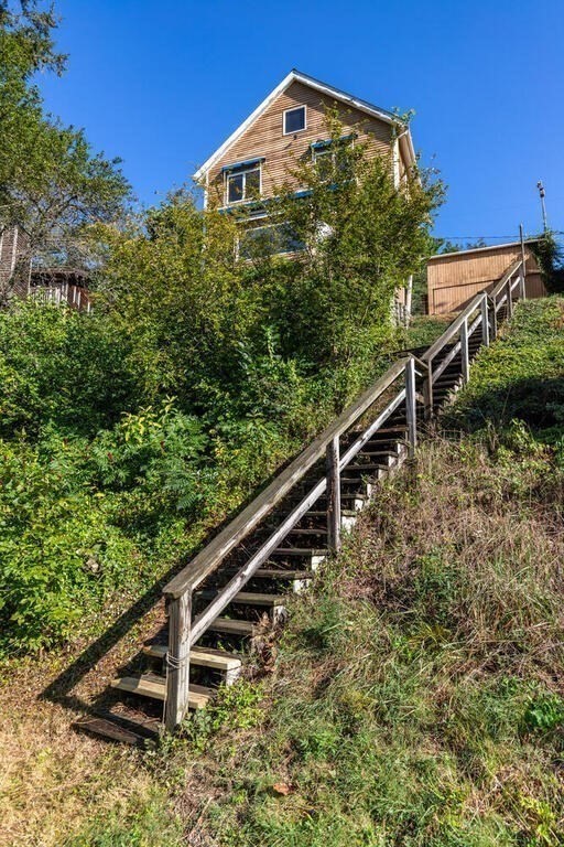 98 Dudley Road Wayland, MA 01778 - Photo 37 of 41 a view of a house with a yard