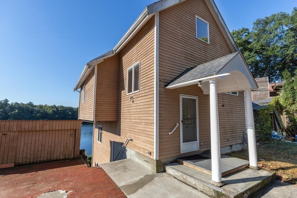 98 Dudley Road Wayland, MA 01778 - Photo 6 of 41 a view of a house with backyard