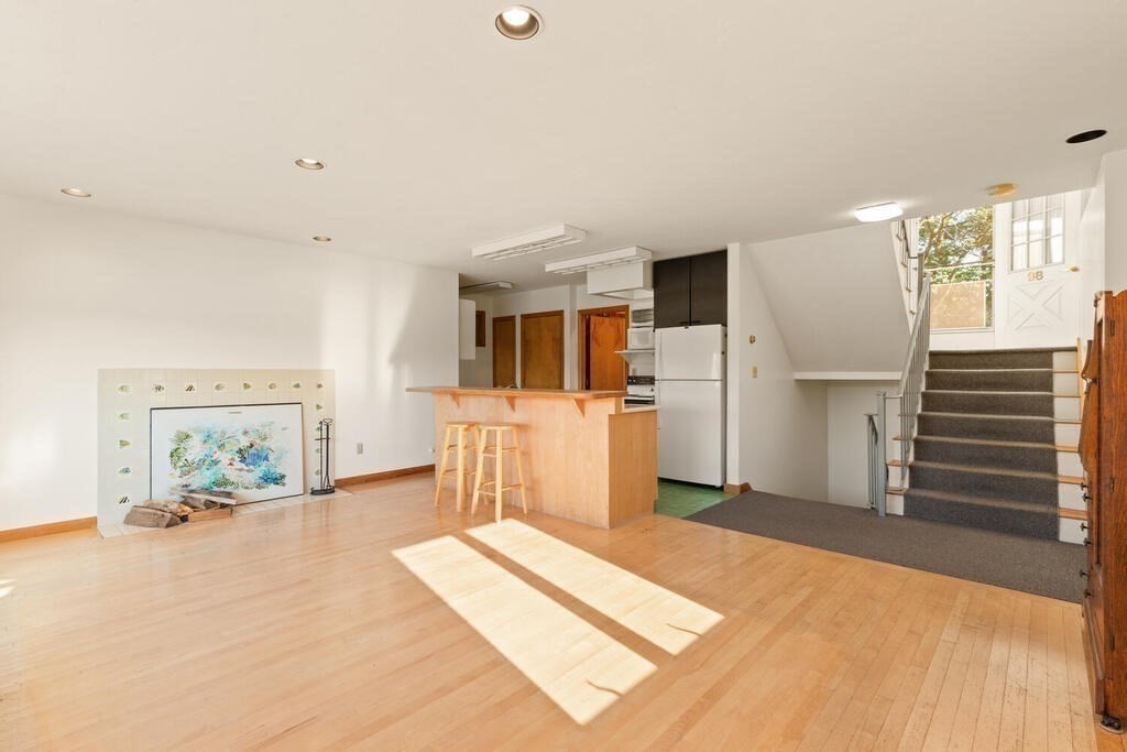 98 Dudley Road Wayland, MA 01778 - Photo 10 of 41 a living room with furniture and a table