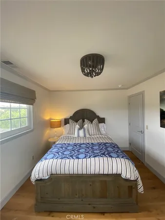 a view of bedroom with a bed