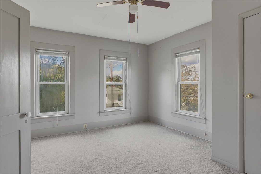 5 Powderhouse Road Corning, NY 14830 - Photo 22 of 47 Natural light streams through multiple windows in