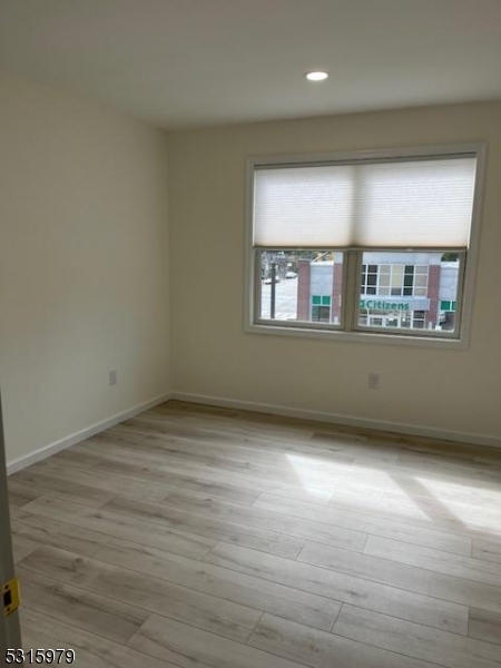 1283 Springfield Avenue, Unit B New Providence, NJ 07974 - Photo 12 of 15 an empty room with a window