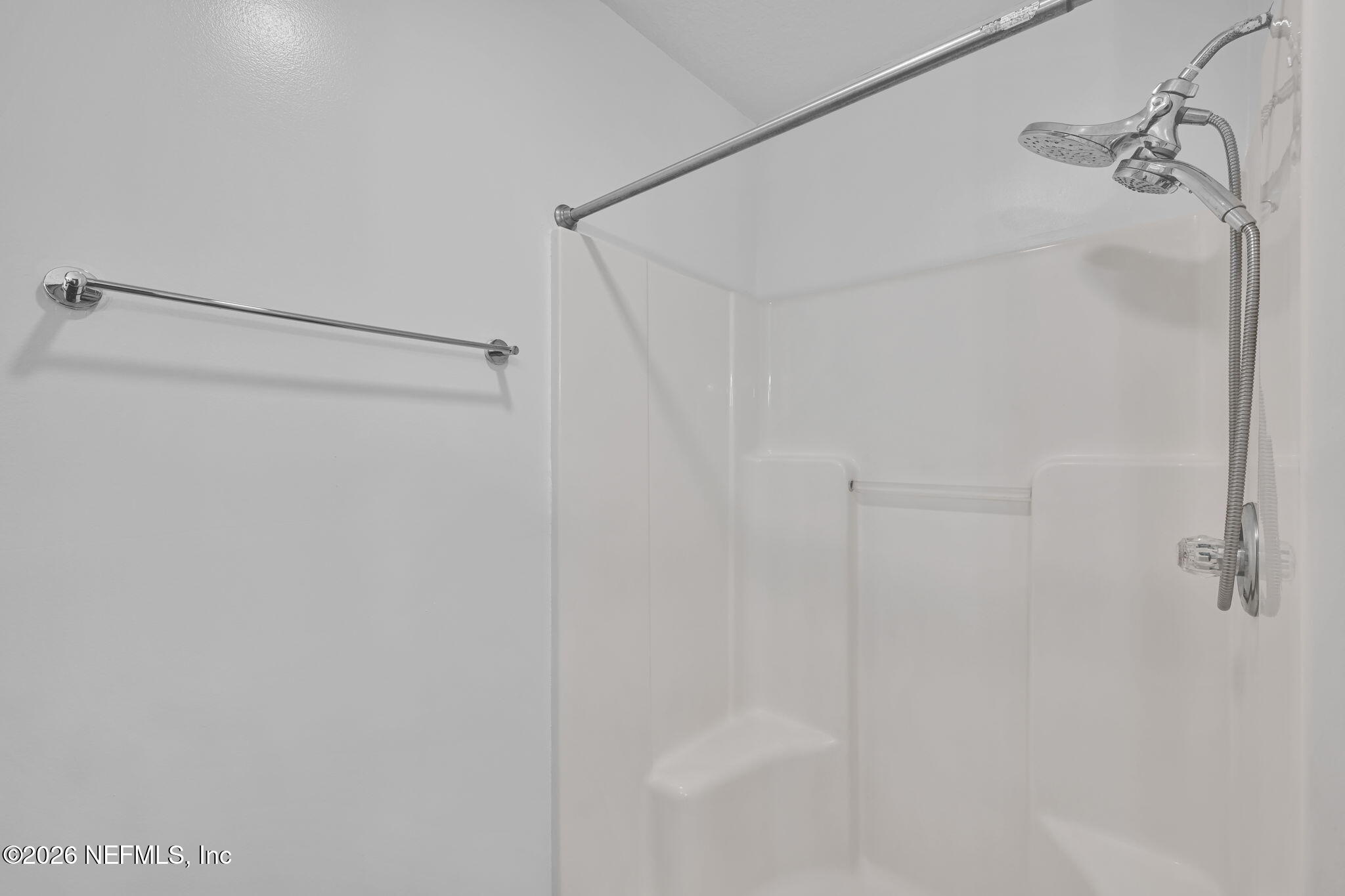 1110 Woodlawn Road, Unit D St. Augustine, FL 32084 - Photo 30 of 40 a bathroom with a shower