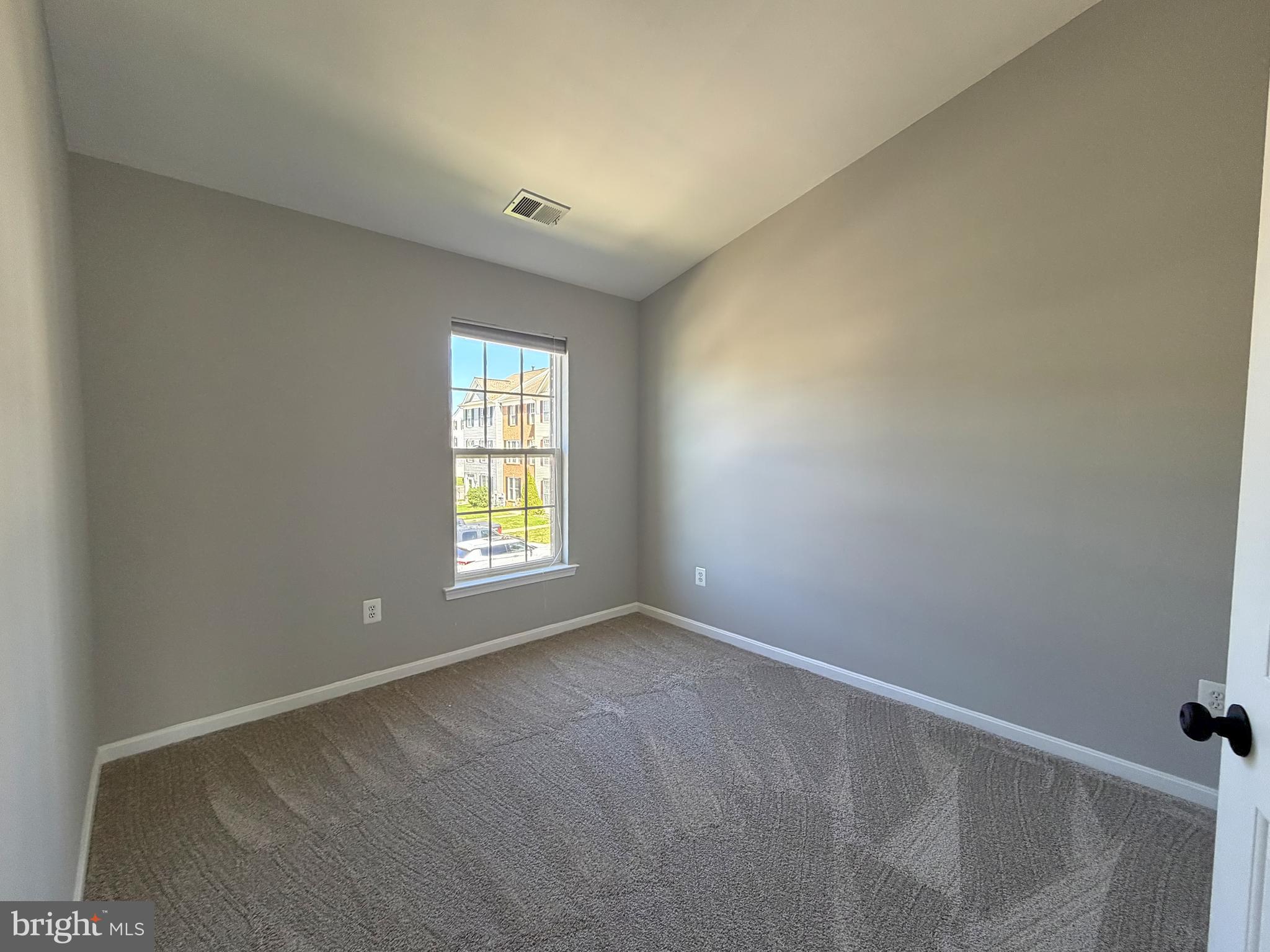 1816 Graymount Way Edgewood, MD 21040 - Photo 14 of 23 a view of an empty room with a window