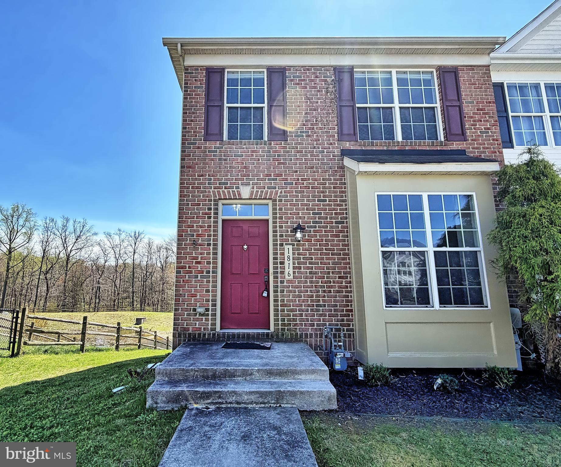 1816 Graymount Way Edgewood, MD 21040 - Photo 2 of 23 a front view of a house with garden
