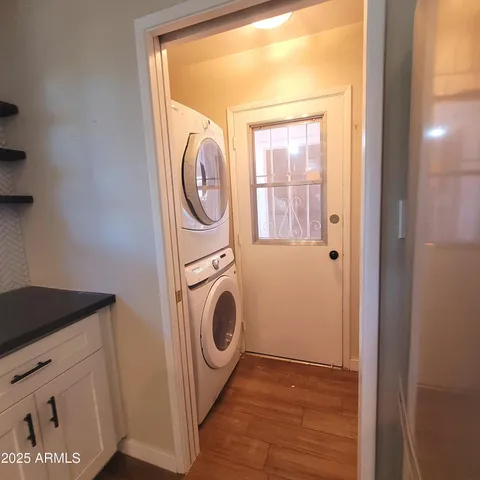 a utility room with dryer and washer