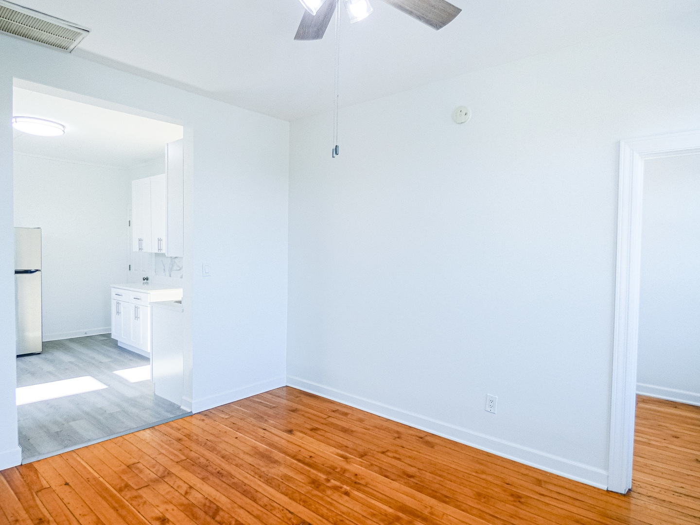 2044 West 19th Street, Unit 3R Chicago, IL 60608 - Photo 8 of 11 a view of a bedroom with wooden floor and bedroom