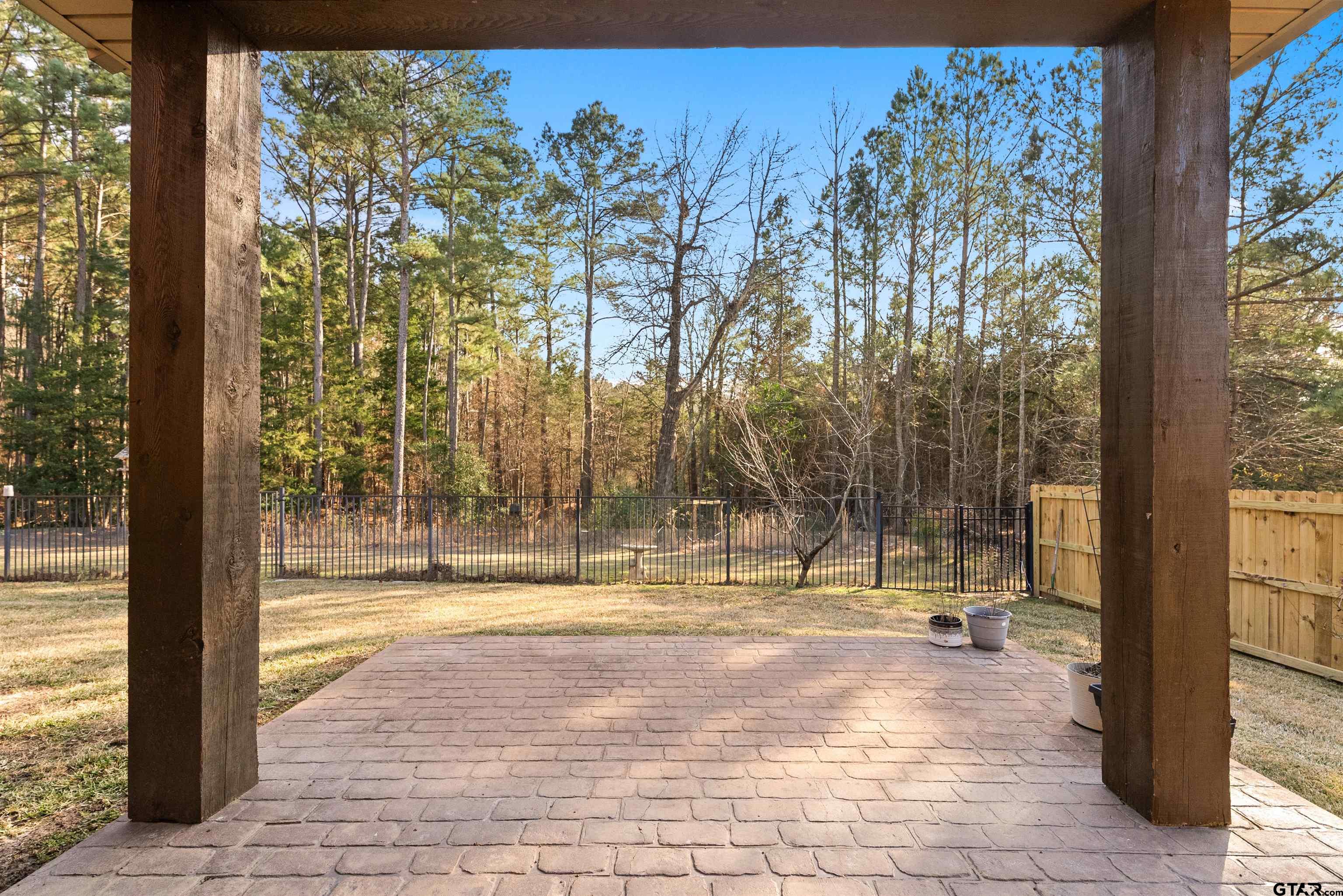 714 Huntwick Lane Tyler, TX 75703 - Photo 12 of 39 a view of swimming pool with a backyard