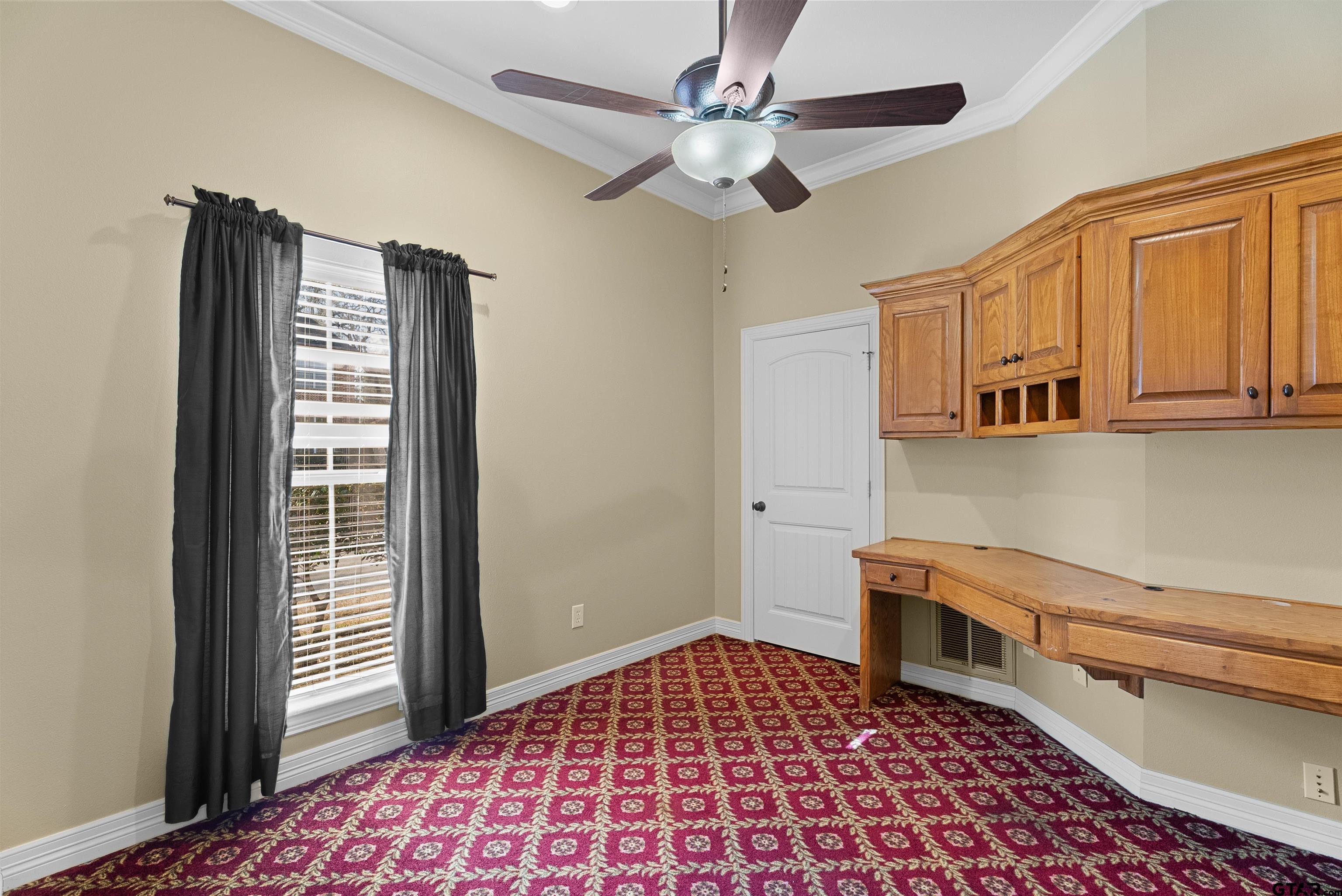 714 Huntwick Lane Tyler, TX 75703 - Photo 26 of 39 a room with closet and wooden floor