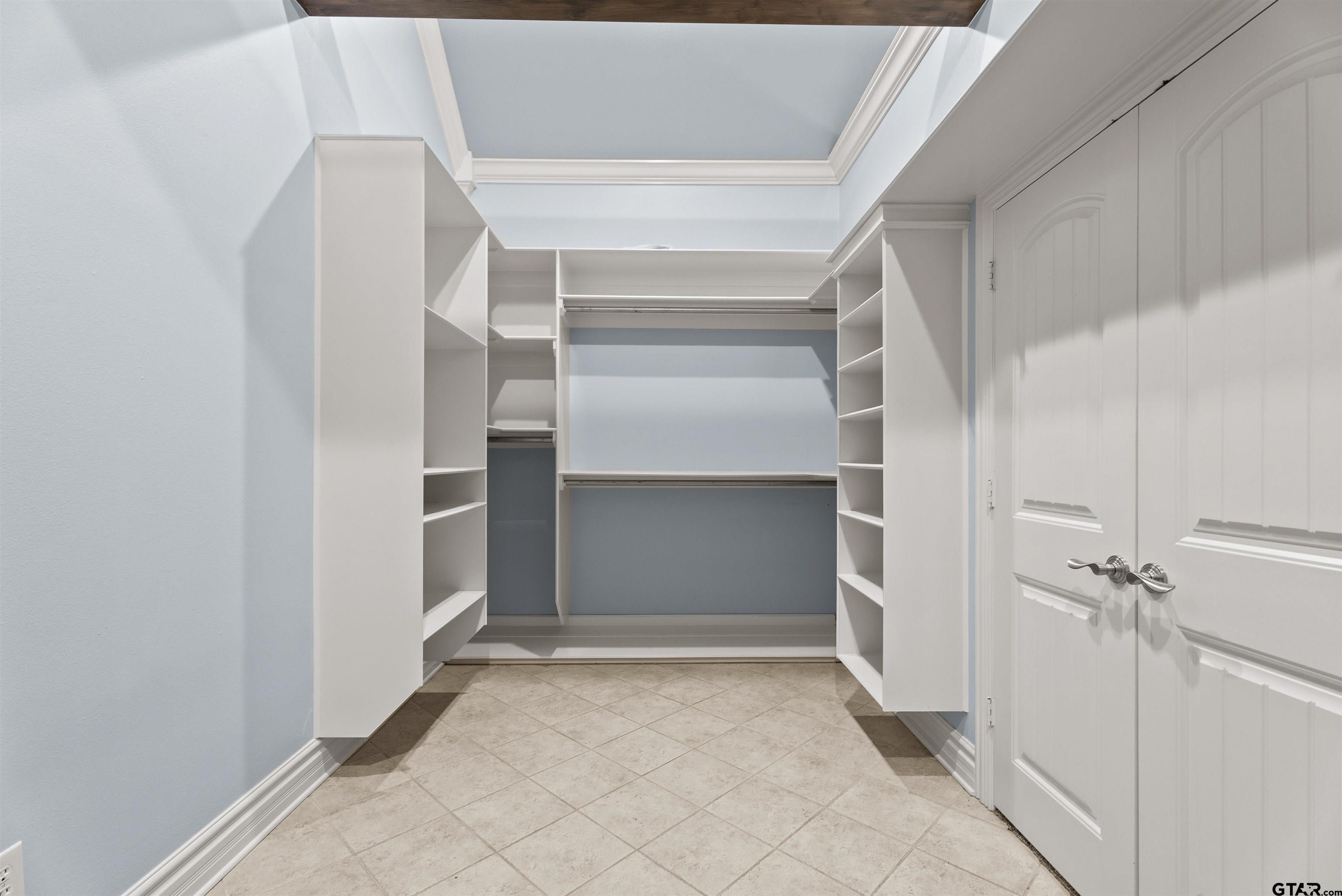 714 Huntwick Lane Tyler, TX 75703 - Photo 3 of 39 a view of an empty walk in closet