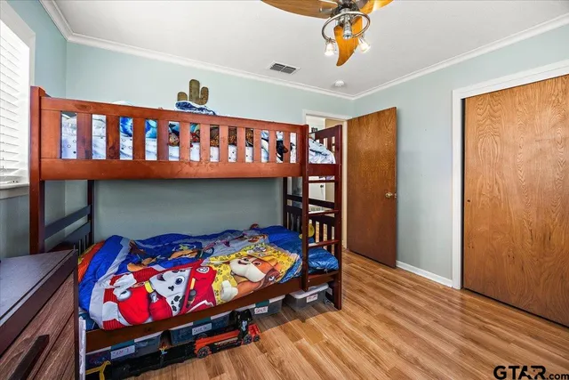 a bedroom with bunk bed
