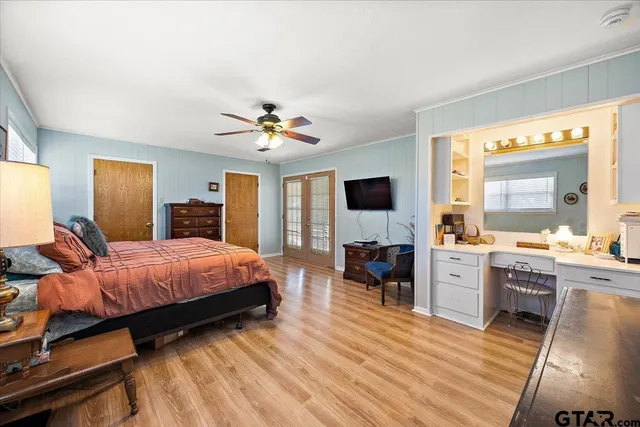 a bed room with a bed and furniture