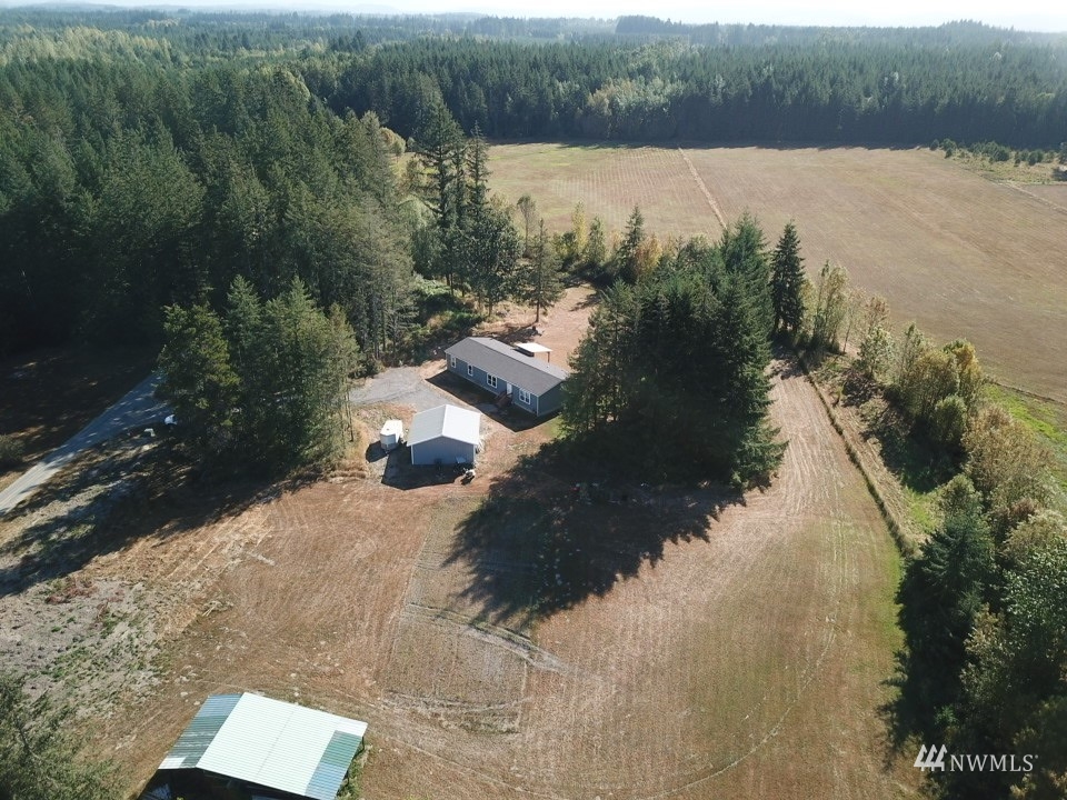 234 Boone Road Toledo, WA 98591 - Photo 1 of 33 an aerial view of a house with a yard