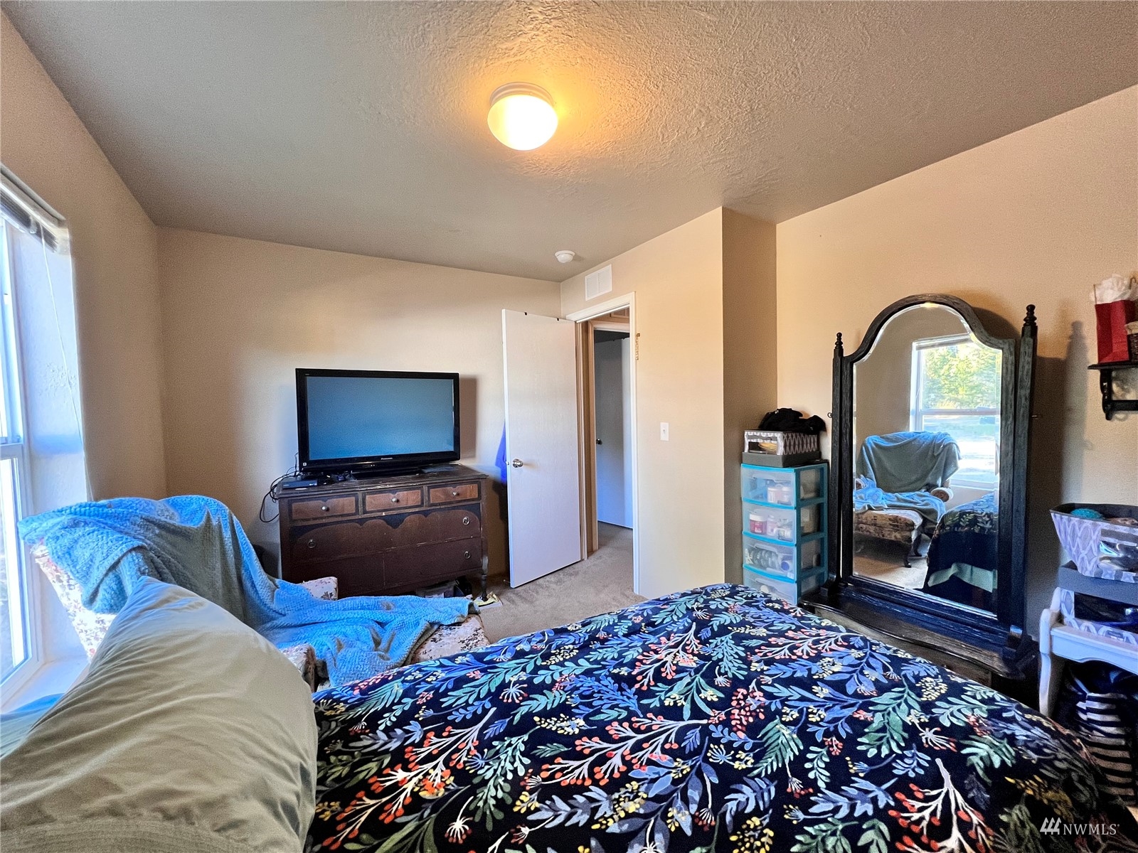 234 Boone Road Toledo, WA 98591 - Photo 14 of 33 a bedroom with bed and walk in closet