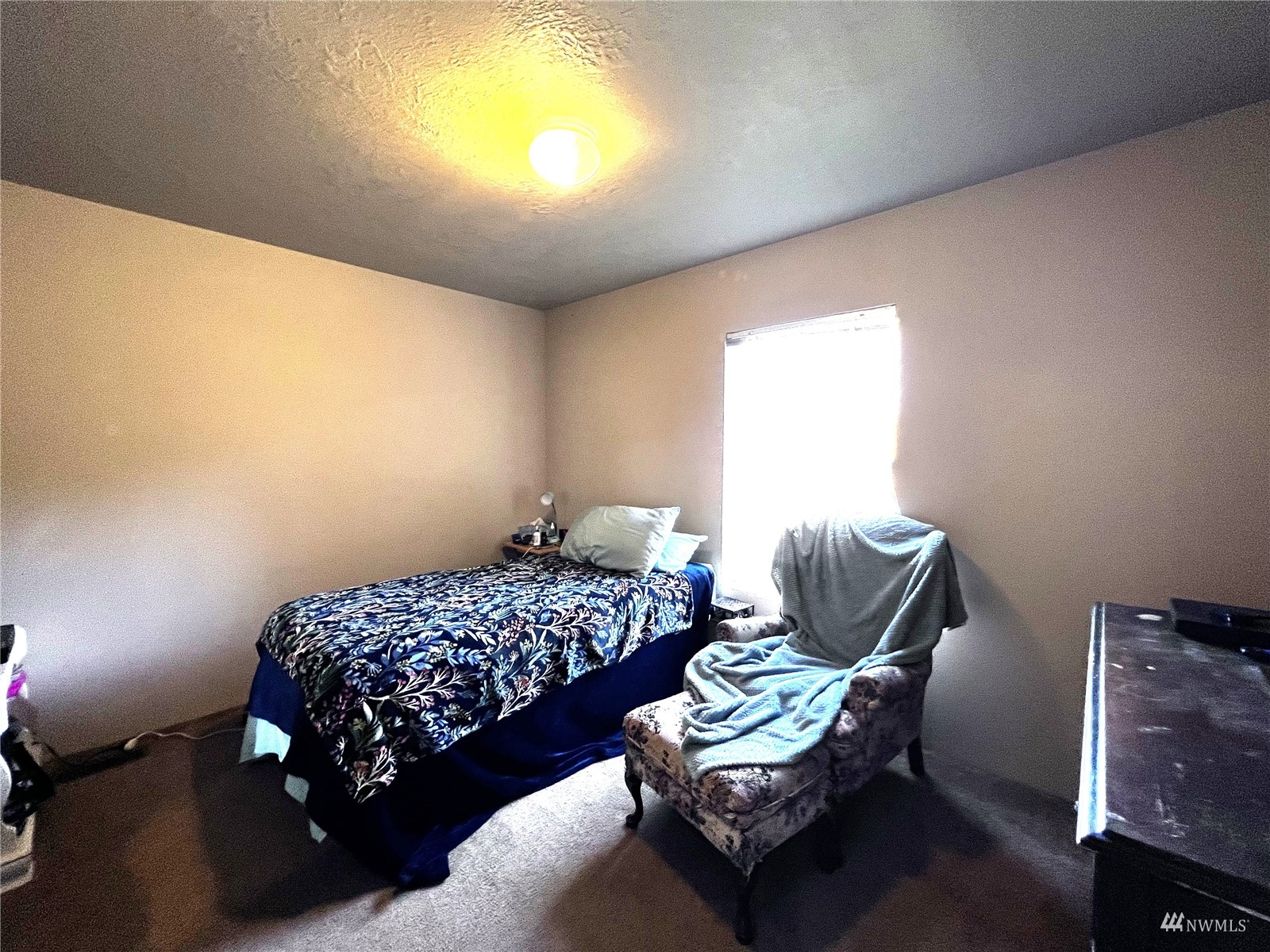 234 Boone Road Toledo, WA 98591 - Photo 15 of 33 a bedroom with bed chair and window