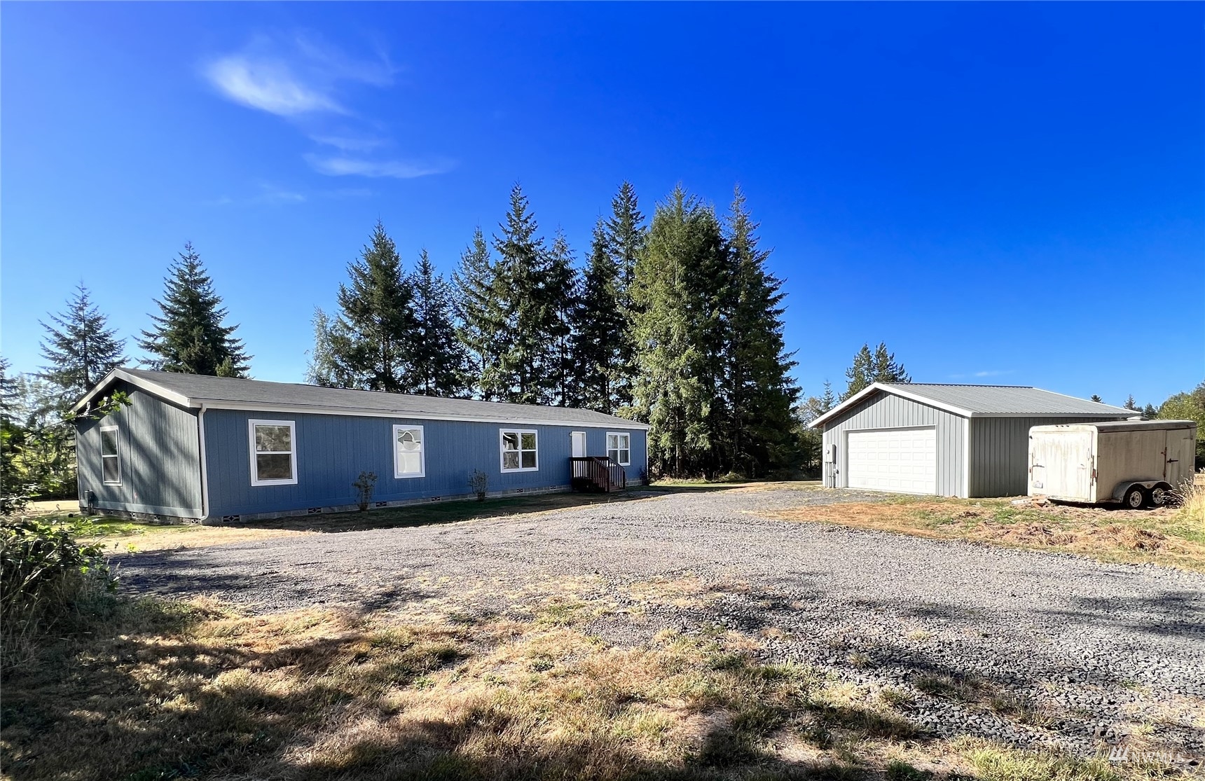 234 Boone Road Toledo, WA 98591 - Photo 2 of 33 a view of a house with a yard