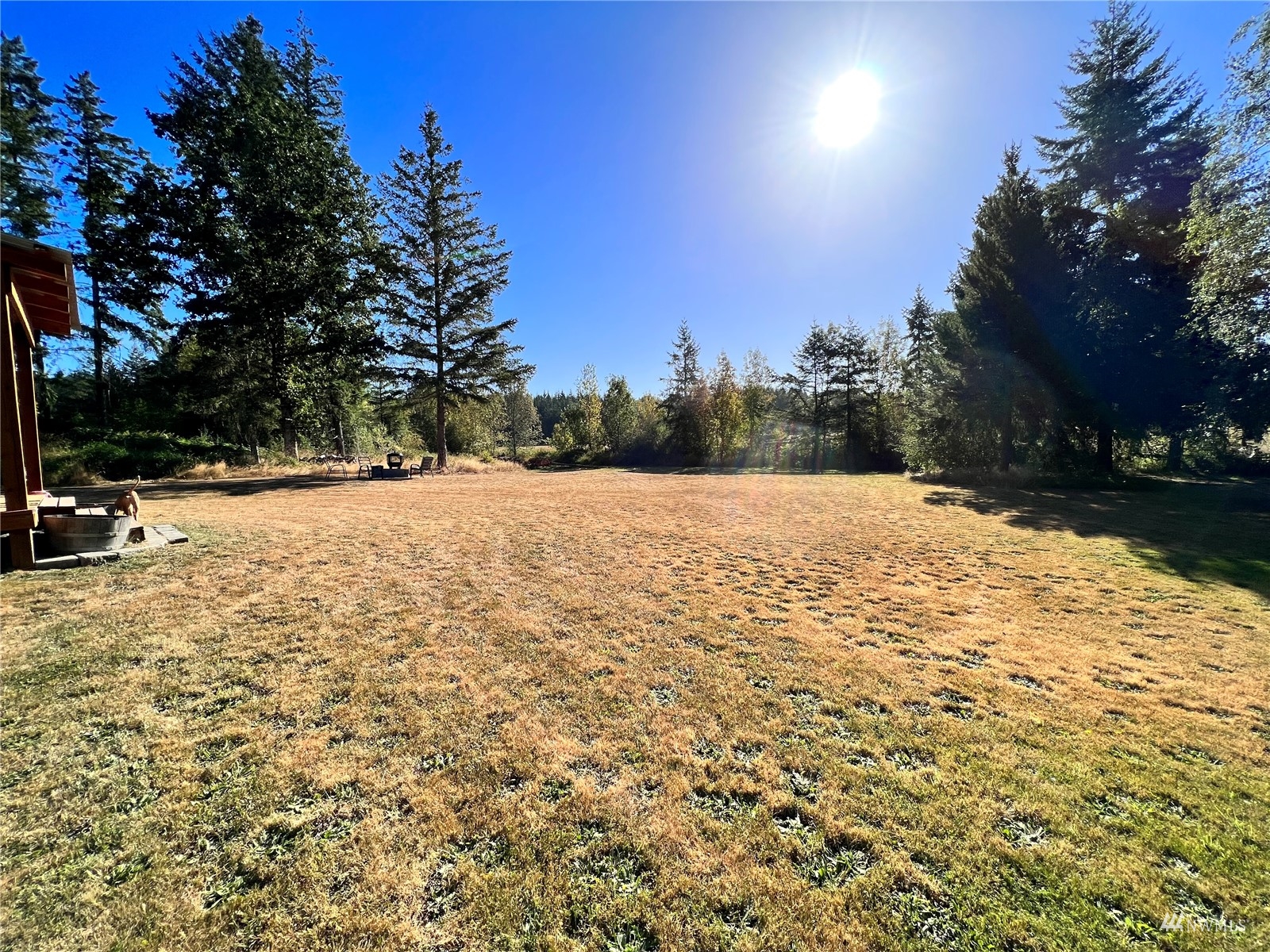 234 Boone Road Toledo, WA 98591 - Photo 25 of 33 a view of swimming pool with an outdoor space and seating area