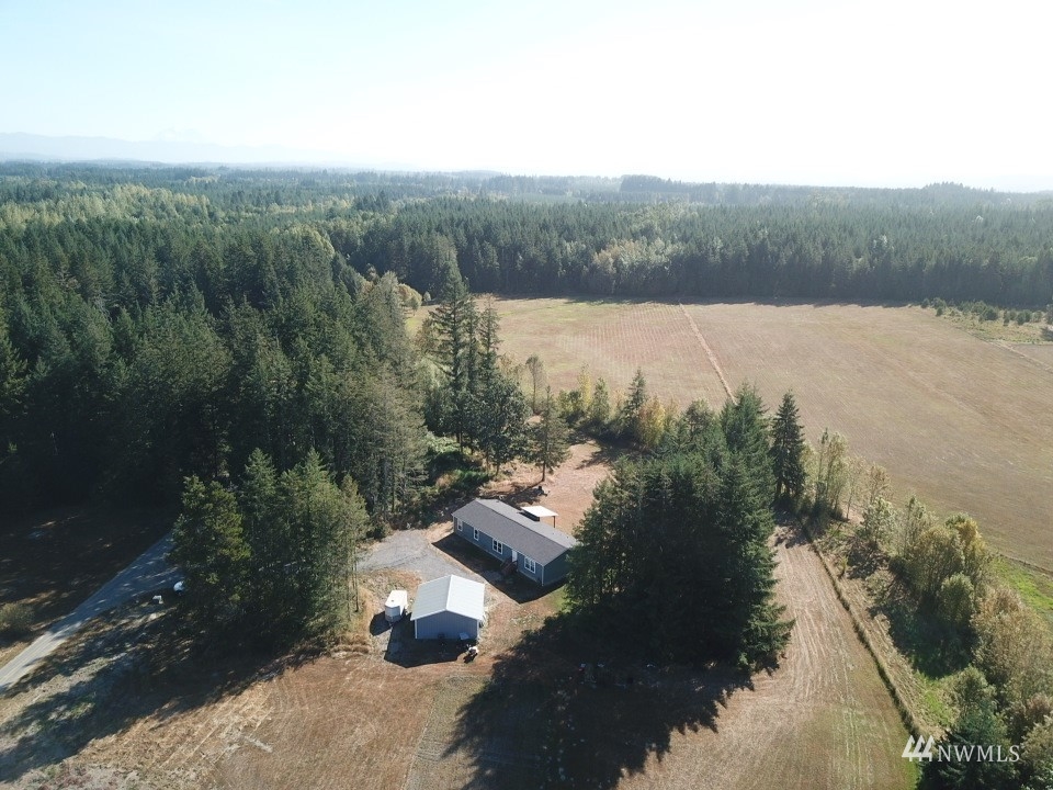 234 Boone Road Toledo, WA 98591 - Photo 28 of 33 a view of a lake with mountain