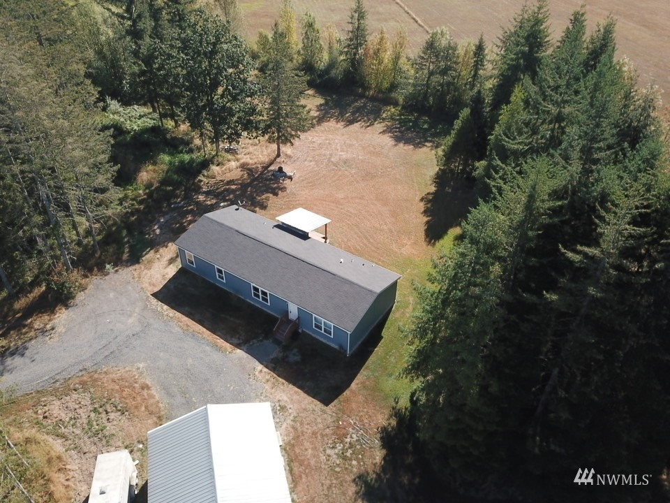 234 Boone Road Toledo, WA 98591 - Photo 30 of 33 a view of a back yard of the house